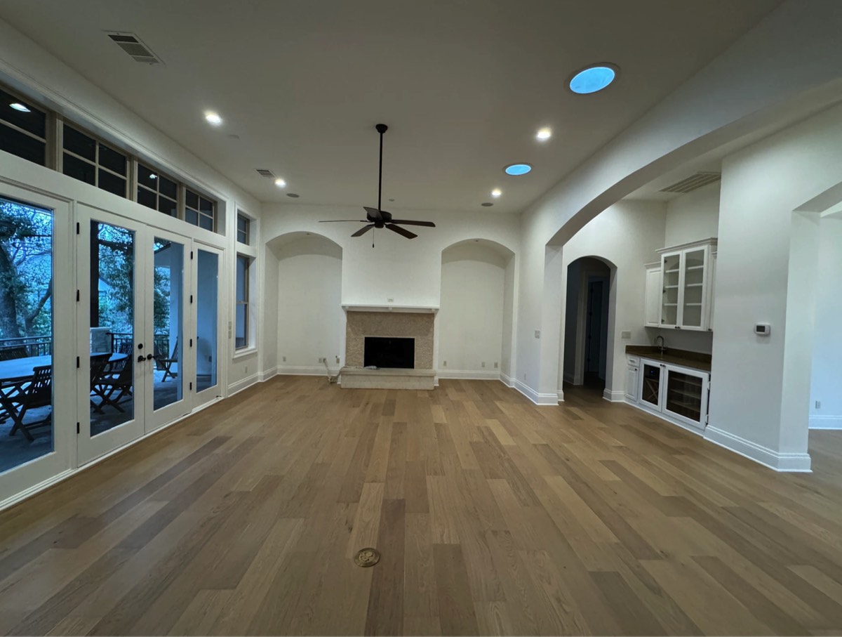 Open living area with freshly painted walls, ceilings and trim