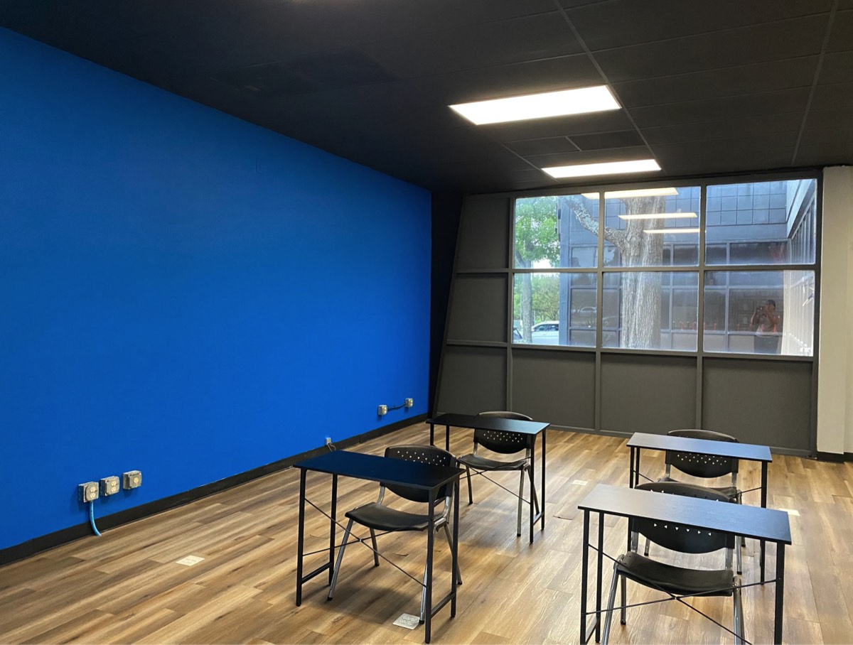 Bold blue accent wall with crisp cut-in edges